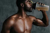 Black man drinking energy drink