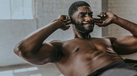 African American man doing sit-ups exercises wallpaper