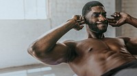 African American man doing sit-ups exercises wallpaper