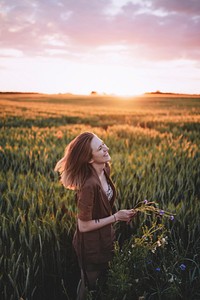 Cheerful woman in a field