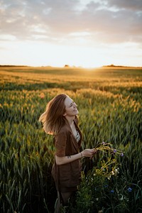 Cheerful woman in a field