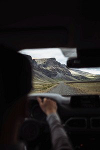 Man driving on a dirt road in Iceland