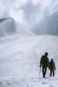 Hikers walking down the Aiguille du Midi