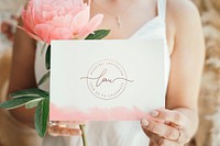 Bride holding a white wedding card mockup