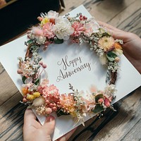 Floral wreath anniversary greeting card
