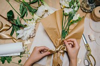 Woman making a flower bouquet