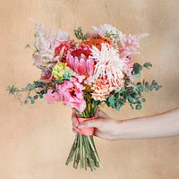 Woman holding a bouquet of flowers