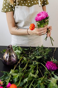 Woman making a bouquet of flowers