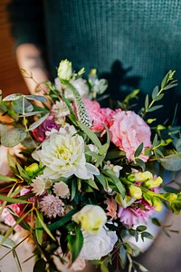 Woman holding a bouquet of flowers