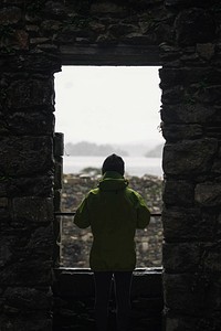 Traveler in a Kilchurn Castle, Scotland