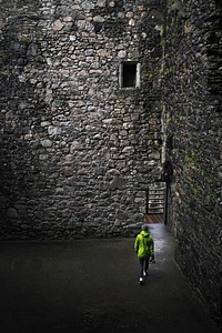 Traveler in a Kilchurn Castle, Scotland