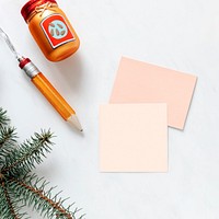 Card mockups with baubles on white marble background