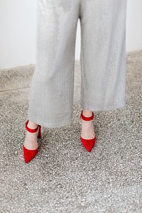 Fashionable woman in red heels