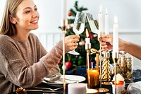 Blond woman having a romantic Christmas dinner