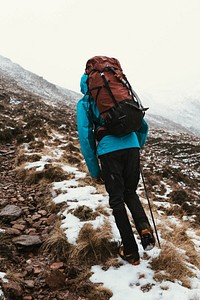 Mountaineer climbing Forcan Ridge in Glen Shiel, Scotland