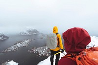 Backpackers hiking Reinebringen in the Lofoten Islands, Norway