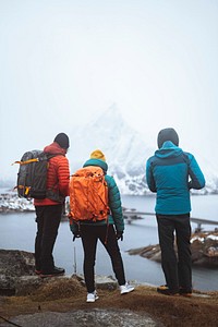 Backpackers hiking in Hamnoy, Lofoten Island, Norway