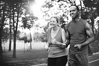 Couple running together at a park