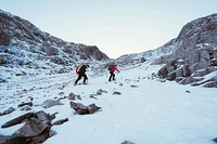 Mountaineers climbing the snowy mountain