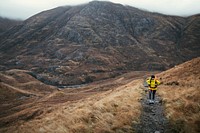 Hiker at Buachaille Etive Beag in Scotland