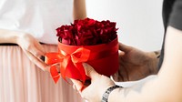 Boyfriend surprising his girlfriend with roses wallpaper