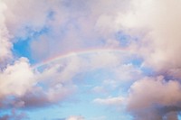 Aesthetic rainbow against blue sky background