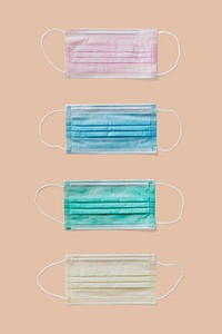 Surgical mask collection on a beige background 