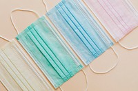 Surgical mask collection on a beige background 