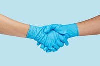 Medical staff shaking hands during coronavirus pandemic