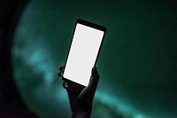 Smartphone screen mockup at the planetarium psd
