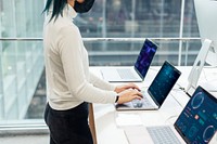 Girl checking the laptop product showcase at a shop