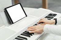 Digital tablet screen mockup on a white piano psd