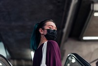 Girl wearing a face mask in the new normal downtown Bangkok