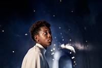 Man experiencing the universe at a planetarium 