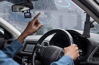 Interactive transparent window screen mockup in a smart car