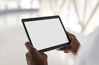 Man holding a white screen digital tablet