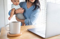 Father working remotely with kid