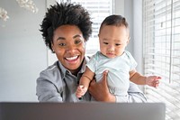 Mom working from home remotely with kid