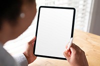 Woman working on a digital tablet mockup 