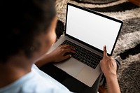 African American woman working from home on a laptop during covid19