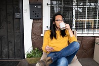 Asian man using smartphone during coffee break