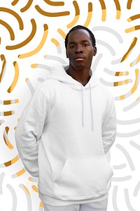 Sporty orange outfit hoodie and sweatpants on abstract background