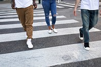 Streetwear apparel jeans men and women crossing road in city