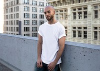 Casual white t-shirt man in the city apparel shoot