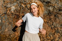 Happy woman in white crop top outdoor photoshoot