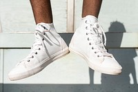 Ankle sneakers mockup psd in white beach fashion shoot