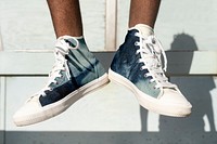 Ankle sneakers mockup psd in white beach fashion shoot