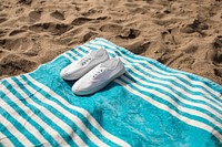 White sneakers on beach towel summer vibes photography