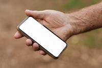 Senior man holding smartphone with white screen