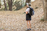 Woman appreciating the beauty of the forest